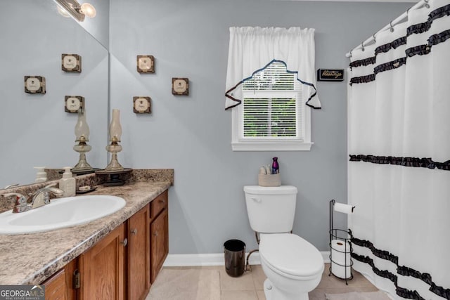 188 Mayapple Gln, Dawsonville, GA 30534 - full bathroom with baseboards, tile patterned flooring, vanity, toilet, and a shower with curtain