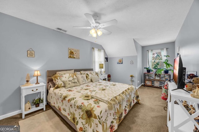 188 Mayapple Gln, Dawsonville, GA 30534 - bedroom featuring carpet flooring, baseboards, a textured ceiling, vaulted ceiling, and ceiling fan