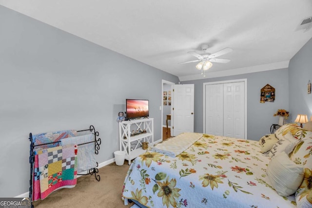188 Mayapple Gln, Dawsonville, GA 30534 - bedroom with carpet, a closet, a ceiling fan, and baseboards
