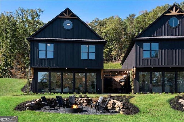 132 Marina Parc Dr, Waleska, GA 30183 - back of house with a fire pit and a yard
