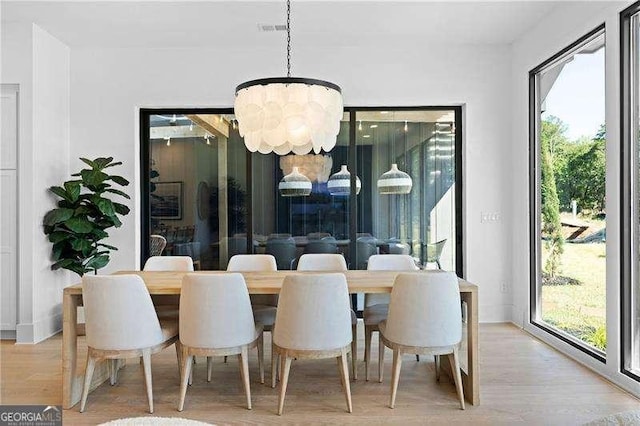 132 Marina Parc Dr, Waleska, GA 30183 - dining space with a chandelier and wood finished floors