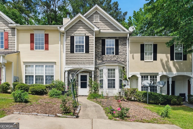 1689 Camden Forrest Way, Riverdale, GA 30296 - multi unit property with a chimney and stone siding