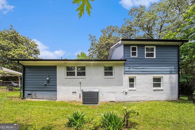 479 Charter Oak Dr SW, Atlanta, GA 30331 - back of house with a lawn, brick siding, and crawl space