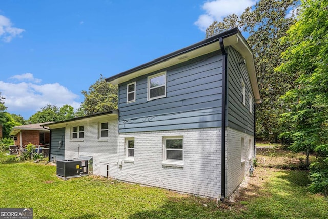 479 Charter Oak Dr SW, Atlanta, GA 30331 - rear view of property with brick siding and a yard