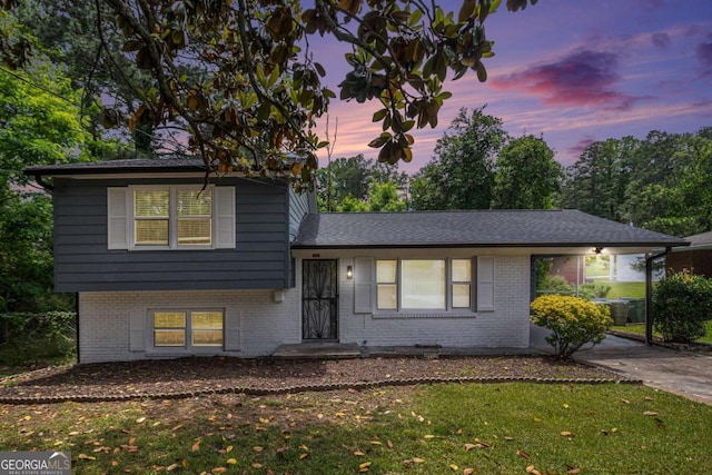 479 Charter Oak Dr SW, Atlanta, GA 30331 - split level home with a front yard and brick siding