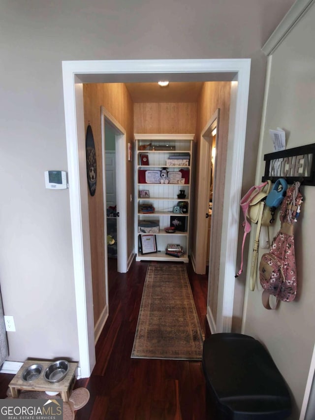 corridor featuring wood finished floors