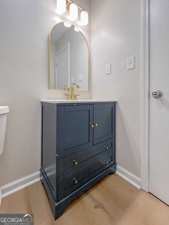 330 Stonehenge Way, Athens, GA 30606 - bathroom featuring baseboards, vanity, toilet, and wood finished floors