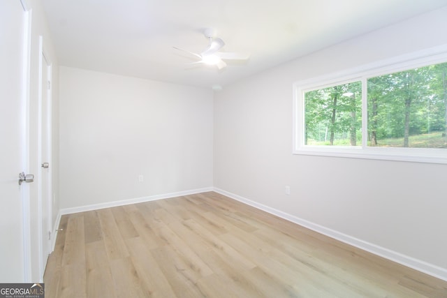 330 Stonehenge Way, Athens, GA 30606 - empty room with light wood-style flooring, baseboards, and a ceiling fan
