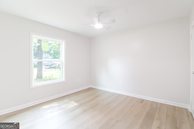 330 Stonehenge Way, Athens, GA 30606 - unfurnished room featuring light wood-type flooring, a ceiling fan, and baseboards