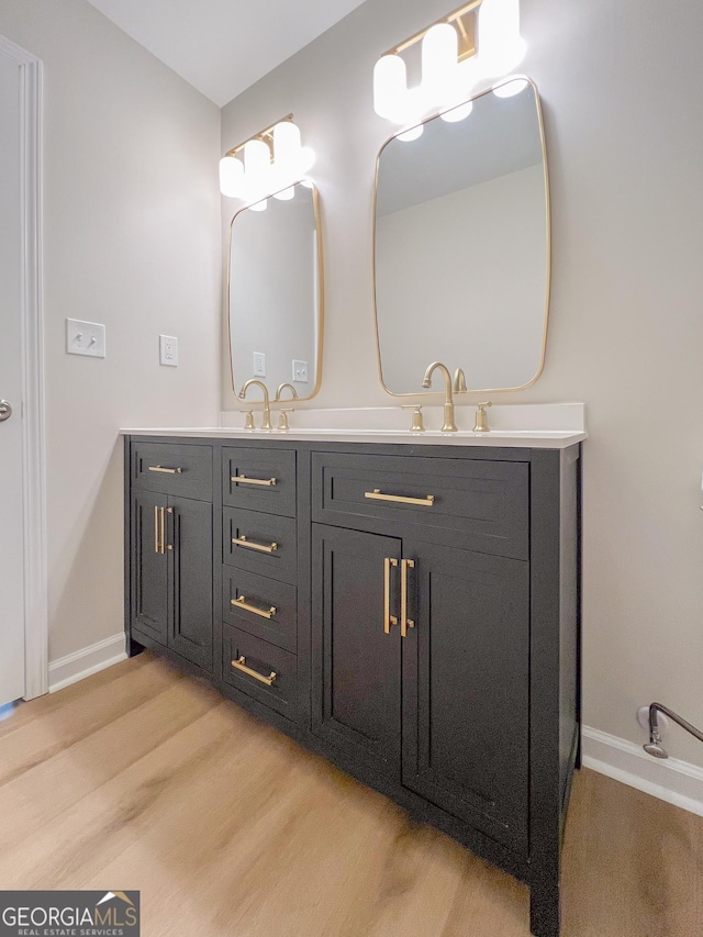 330 Stonehenge Way, Athens, GA 30606 - bathroom featuring wood finished floors, double vanity, and baseboards
