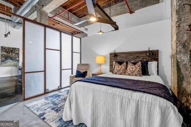 650 Glen Iris Dr NE Unit 27, Atlanta, GA 30308 - bedroom with concrete flooring