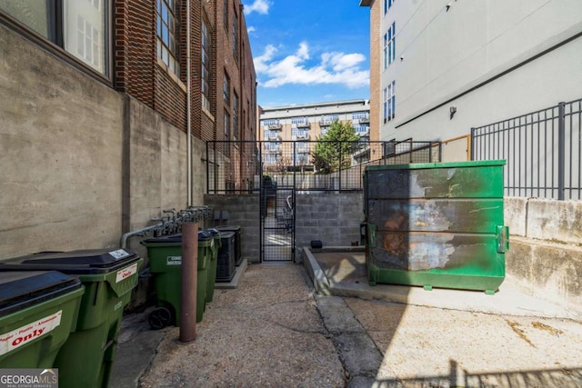650 Glen Iris Dr NE Unit 27, Atlanta, GA 30308 - view of patio with a gate