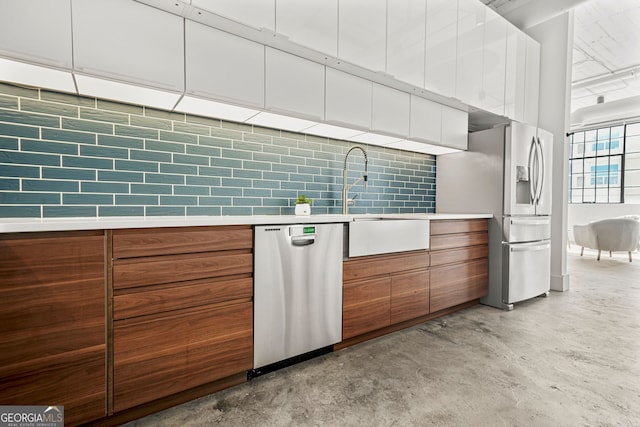 434 Marietta St NW Unit 401, Atlanta, GA 30313 - kitchen featuring stainless steel appliances, finished concrete floors, modern cabinets, and light countertops