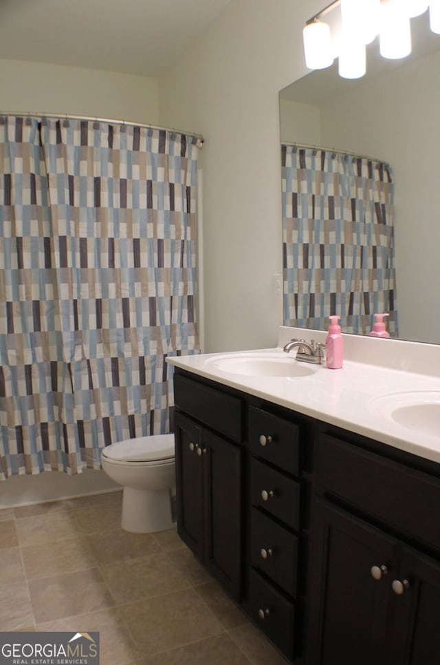878 W Union Grove Cir, Auburn, GA 30011 - bathroom featuring double vanity, tile patterned flooring, and curtained shower