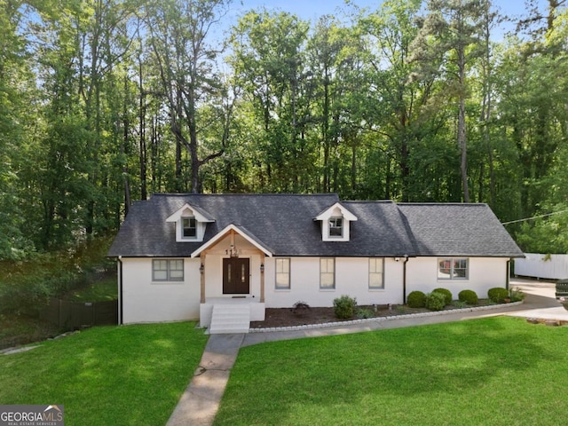 modern inspired farmhouse with a shingled roof