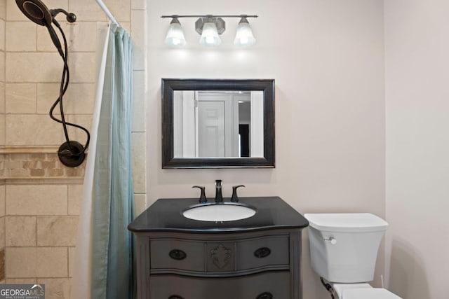 full bathroom with vanity, toilet, and a shower with shower curtain
