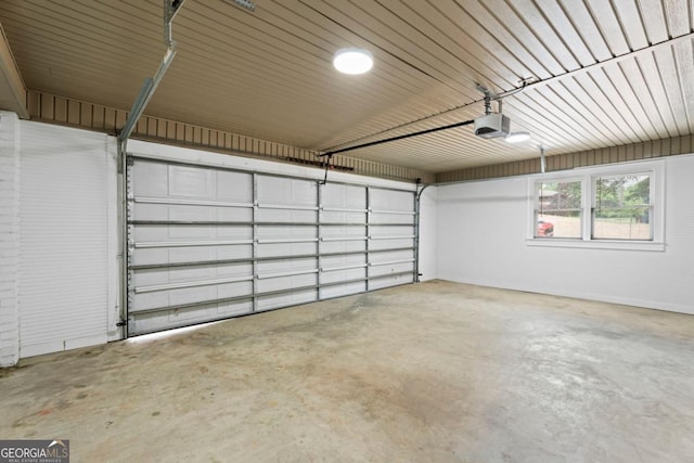 garage featuring a garage door opener