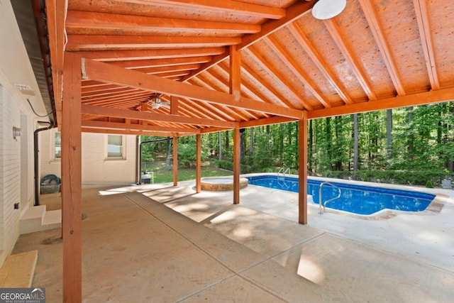 swimming pool with a patio