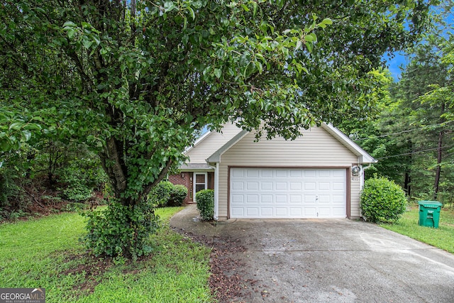 4732 Browns Mill Ferry Rd, Lithonia, GA 30038 - obstructed view of property with driveway and a garage