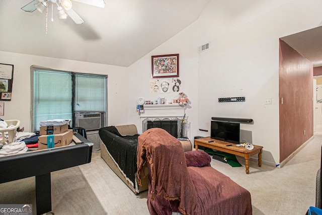 4732 Browns Mill Ferry Rd, Lithonia, GA 30038 - living area with vaulted ceiling, carpet flooring, ceiling fan, cooling unit, and a fireplace