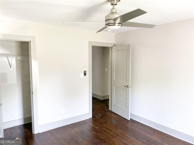 664 Florence Pl NW, Atlanta, GA 30318 - unfurnished bedroom with wood finished floors, a closet, and baseboards