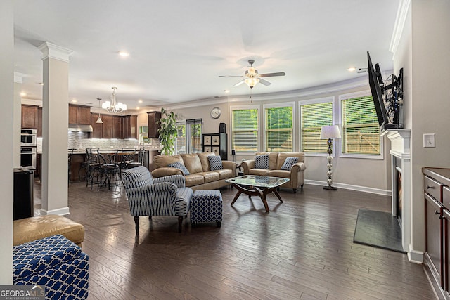 4815 Edgemoore Trce, Cumming, GA 30040 - living area with ceiling fan, a chandelier, recessed lighting, dark wood-style flooring, and ornamental molding