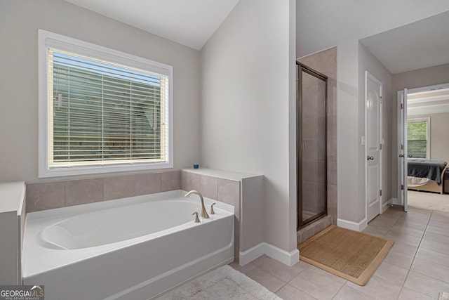 4815 Edgemoore Trce, Cumming, GA 30040 - full bathroom featuring a garden tub, tile patterned floors, connected bathroom, and a stall shower