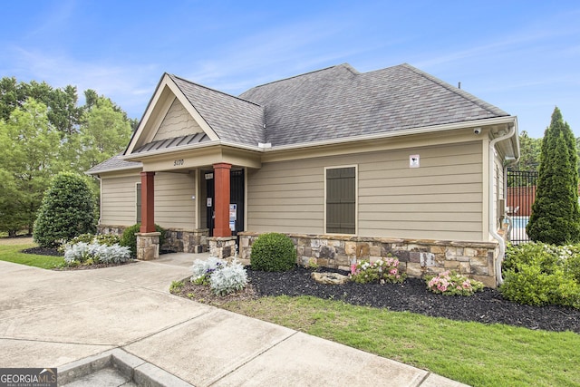 4815 Edgemoore Trce, Cumming, GA 30040 - craftsman-style home with stone siding and roof with shingles