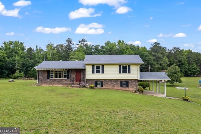1766 Washington Hwy, Elberton, GA 30635 - split level home featuring a front yard, brick siding, and a carport