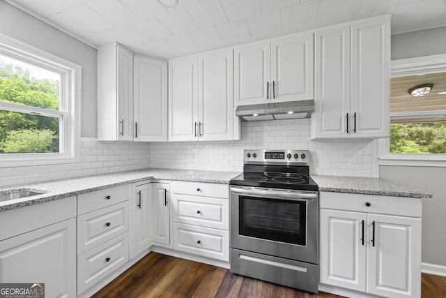 1766 Washington Hwy, Elberton, GA 30635 - kitchen featuring stainless steel electric stove, under cabinet range hood, and white cabinetry
