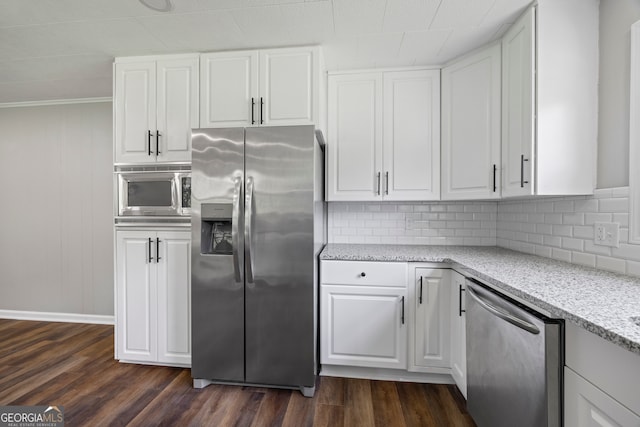 1766 Washington Hwy, Elberton, GA 30635 - kitchen featuring stainless steel appliances, backsplash, dark wood-style floors, white cabinets, and light stone counters