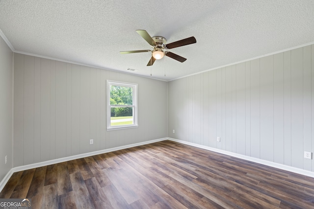 1766 Washington Hwy, Elberton, GA 30635 - spare room with dark wood-type flooring, ceiling fan, a textured ceiling, baseboards, and crown molding