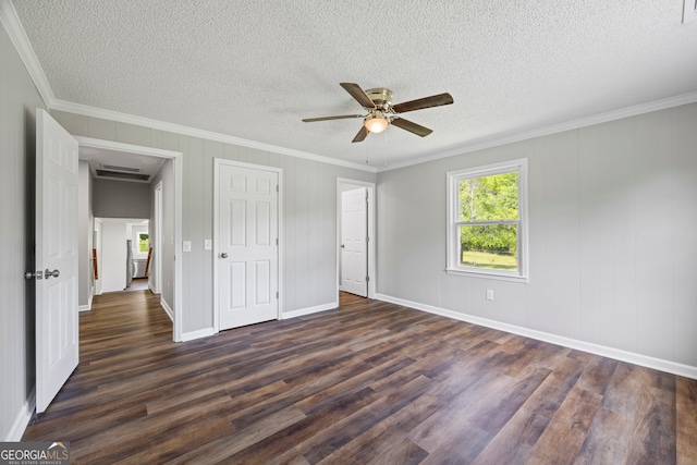 1766 Washington Hwy, Elberton, GA 30635 - unfurnished bedroom featuring dark wood-style flooring, crown molding, a textured ceiling, baseboards, and a ceiling fan