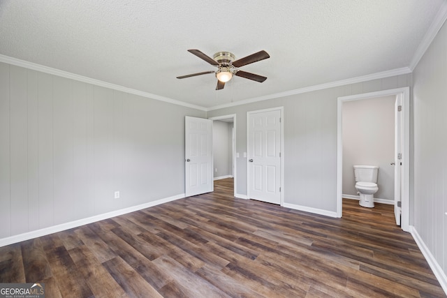1766 Washington Hwy, Elberton, GA 30635 - unfurnished bedroom featuring dark wood-type flooring, baseboards, crown molding, ensuite bath, and ceiling fan
