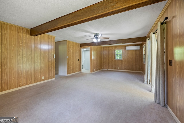 1766 Washington Hwy, Elberton, GA 30635 - carpeted empty room with wooden walls, an AC wall unit, ceiling fan, a textured ceiling, and beam ceiling