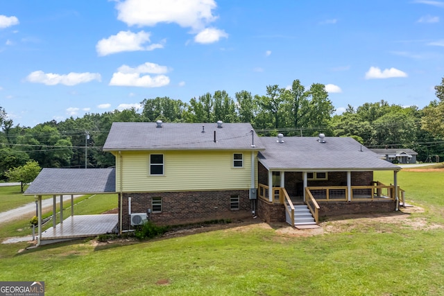 1766 Washington Hwy, Elberton, GA 30635 - rear view of house featuring brick siding, a lawn, and a deck