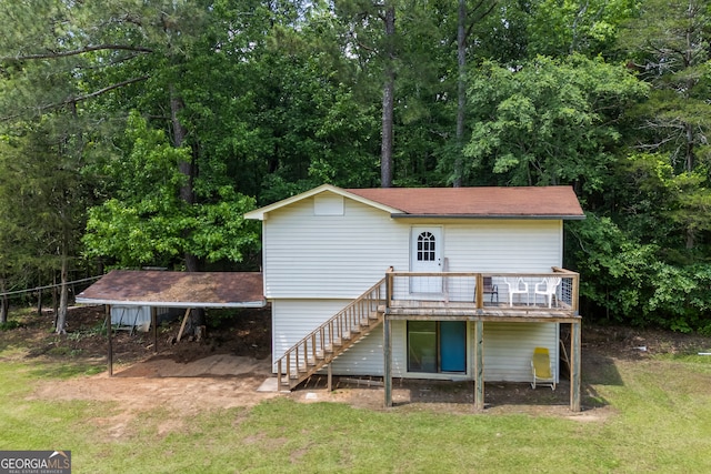1766 Washington Hwy, Elberton, GA 30635 - back of property featuring stairway, a lawn, a deck, and dirt driveway