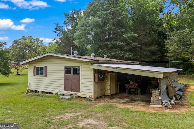 1766 Washington Hwy, Elberton, GA 30635 - view of outbuilding featuring a carport and dirt driveway