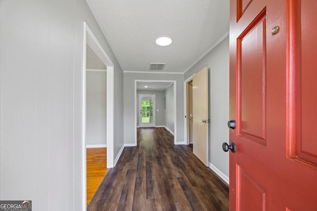 1766 Washington Hwy, Elberton, GA 30635 - hallway featuring dark wood-style floors, ornamental molding, baseboards, and a textured ceiling