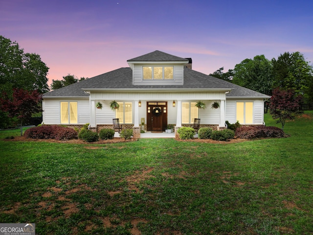 377 Parker Rd, Mcdonough, GA 30252 - view of front of property with covered porch, a lawn, and a shingled roof