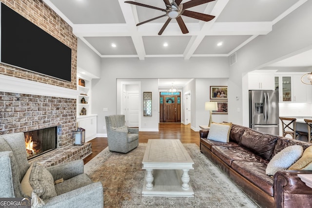 377 Parker Rd, Mcdonough, GA 30252 - living area with ceiling fan, recessed lighting, beam ceiling, wood finished floors, and a fireplace