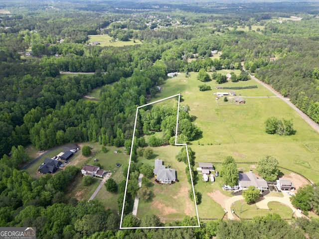 377 Parker Rd, Mcdonough, GA 30252 - aerial view of sparsely populated area with a forest and property parcel outlined