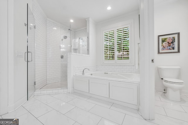 377 Parker Rd, Mcdonough, GA 30252 - bathroom featuring a garden tub, a shower stall, toilet, baseboards, and recessed lighting