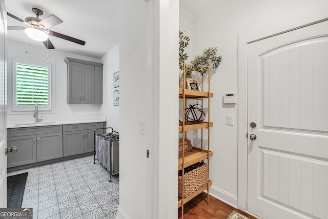 377 Parker Rd, Mcdonough, GA 30252 - kitchen with gray cabinets, a sink, ceiling fan, and light countertops