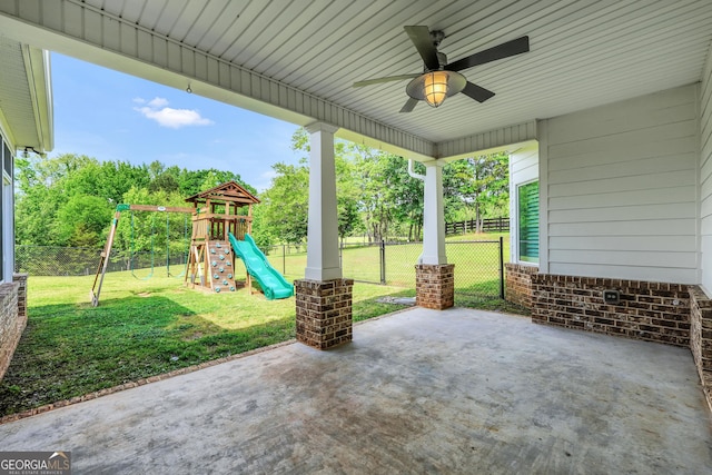 377 Parker Rd, Mcdonough, GA 30252 - view of patio / terrace featuring a ceiling fan and a playground