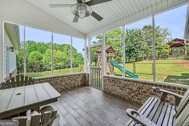 377 Parker Rd, Mcdonough, GA 30252 - unfurnished sunroom featuring lofted ceiling, a ceiling fan, and healthy amount of natural light