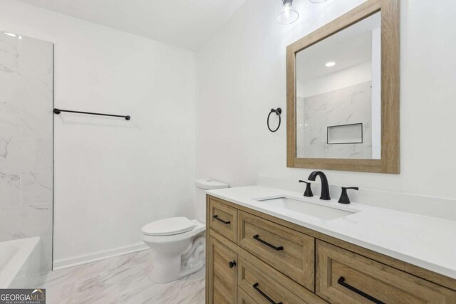 2765 Ocean Valley Dr, Atlanta, GA 30349 - bathroom with toilet, marble look tiles, and vanity
