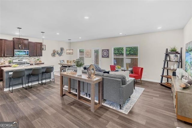 104 Auburn Xing, Auburn, GA 30011 - living room with dark wood finished floors and recessed lighting