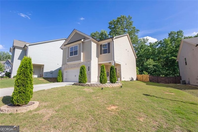 104 Auburn Xing, Auburn, GA 30011 - view of front of home featuring driveway, an attached garage, and stone siding