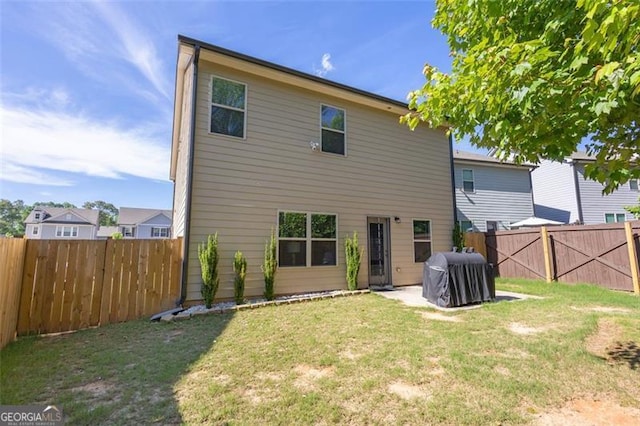104 Auburn Xing, Auburn, GA 30011 - rear view of house featuring a fenced backyard